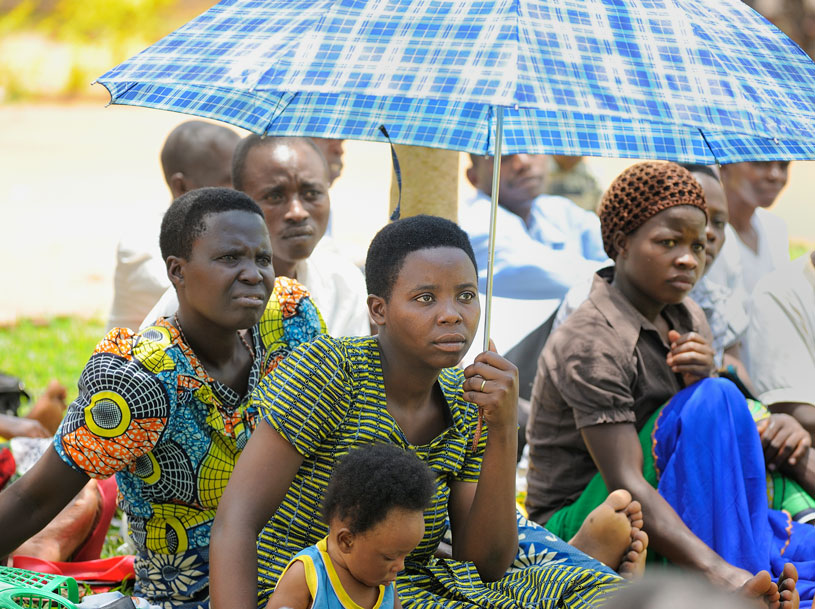 [Community Health Workers during a morning of training on the lawn at Rukumo Health Center, Rwanda.] {Photo credit: Todd Shapera}