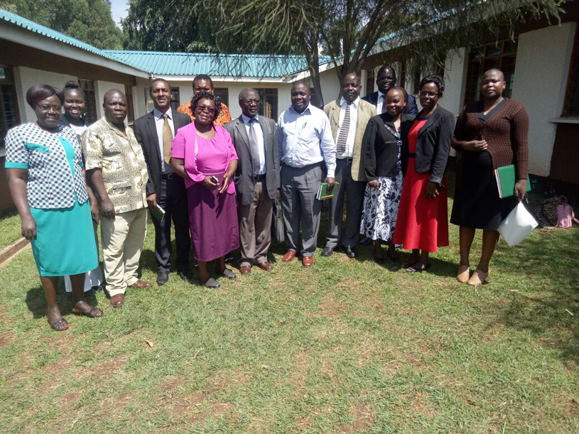  [Staff from Kenya Progressive Nurses Association and County Health Management Team meet to strategize the implementation of the pregnancy club model in Kakamega County.] {Photo credit: MSH Staff.}