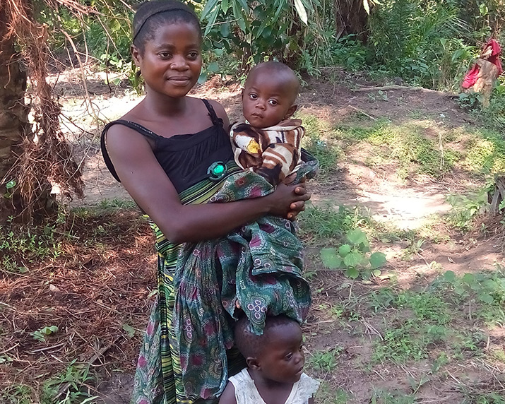 [Mama Mawa credits the new iCCM site with saving her children's lives.]{Photo Credit: Dieudonné Cigajira}