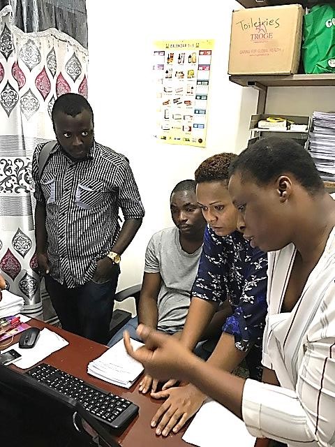 [Data clerks, hospital pharmacists, and representatives from the Directorate of Drugs and Medical Supplies and SIAPS in August 2017 in Sierra Leone.]{Photo Credit: Gabriel Daniel}