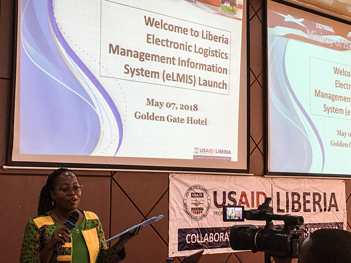 [Liberian Minister of Health, Dr Wilhelmina Jallah, address attendees at the eLMIS launch event.] {Photo Credit: Gashaw Shiferaw/MSH}
