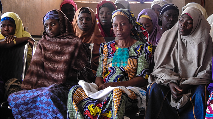 [Women meet during a support group for people living with HIV to share experiences and encourage positive living.]{Photo credit: Saidu Bulus/MSH}