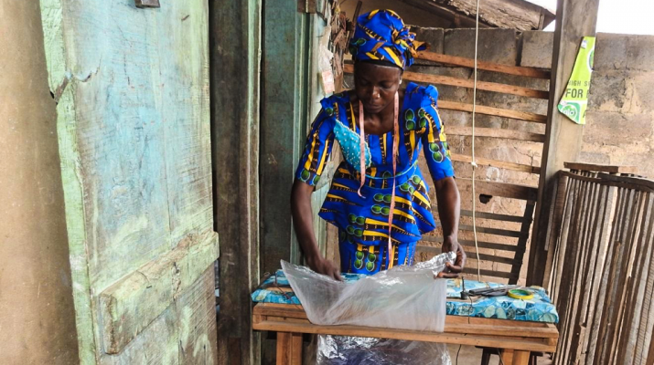 [After nearly losing her business, Adekeye Dorcas now mentors HIV positive pregnant mothers in her community and trains apprentices in the art of nylon production.] {Photo credit: Mary Dauda/MSH}