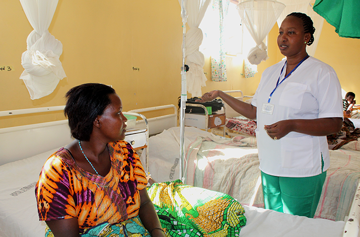 [Beatrice Uzamukunda visits with a nurse in Rwamagana Hospital.] {Photo credit: Irene Nambi, MSH}