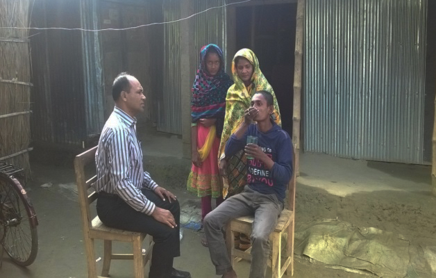 [A community DOT provider visits Rasel's home. Photo credit: Challenge TB Bangladesh]