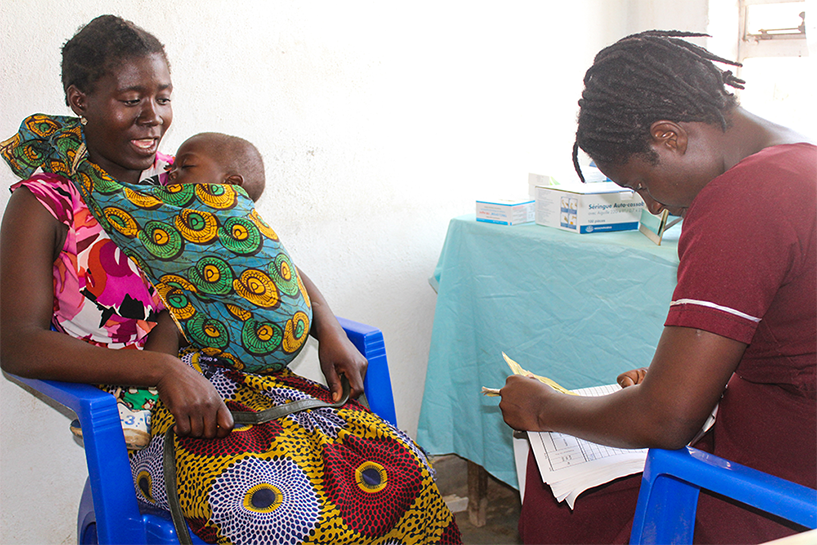 {A mother receives counseling on available family planning methods at Area 18 health center. Photo credit: Rejoice Phiri/MSH}