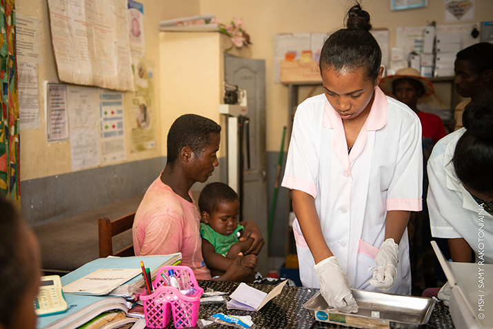 {A nurse prepares a rapid diagnostic test for a child with fever at a health center in Sakaraha, Madagascar. Photo credit: Samy Rakotoniaina/MSH}