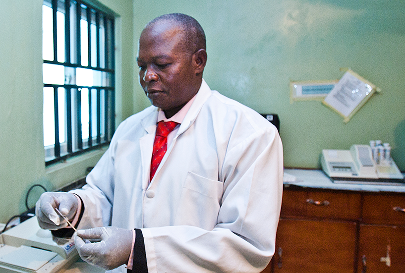{A lab scientist at a general hospital in northern Nigeria. Photo Credit: MSH Staff}