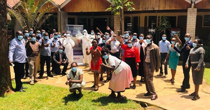 [Participants relax after an infection prevention and control training in Kisii, Kenya.] {Photo credit: Doris Bota/MTaPS}
