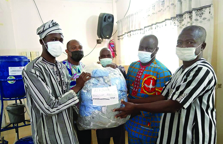 [Donation of material in the department of Atacora. Photo credit: Les Angles d’Afrique]
