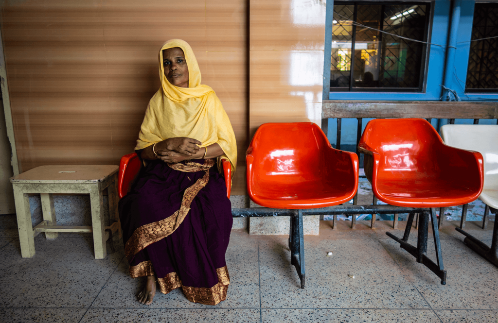 Female patient waits for her doctor's visit in Bangladesh