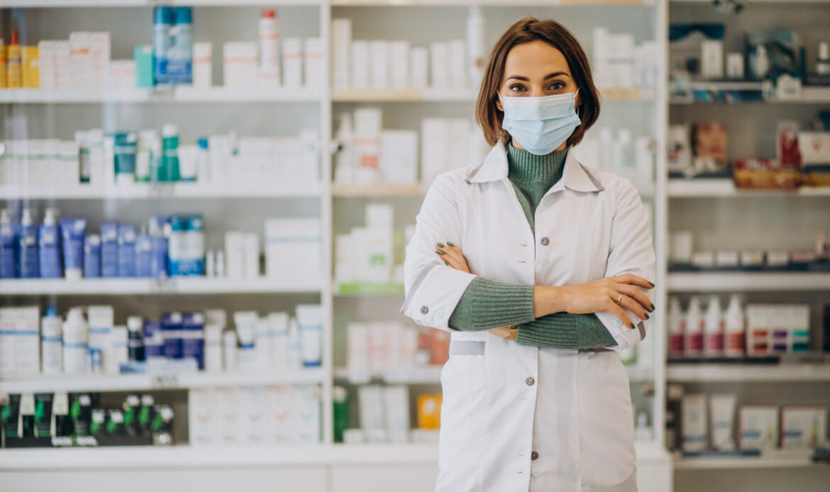 Young woman pharmacist at pharmacy