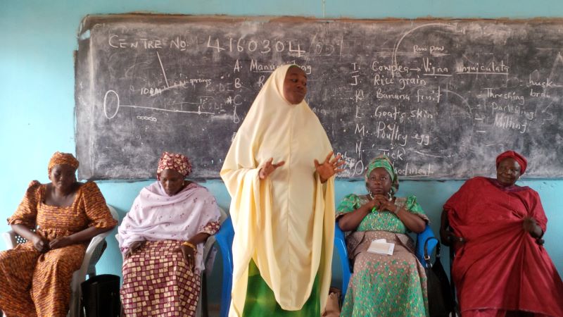 Nigerian woman speaks to a women's group