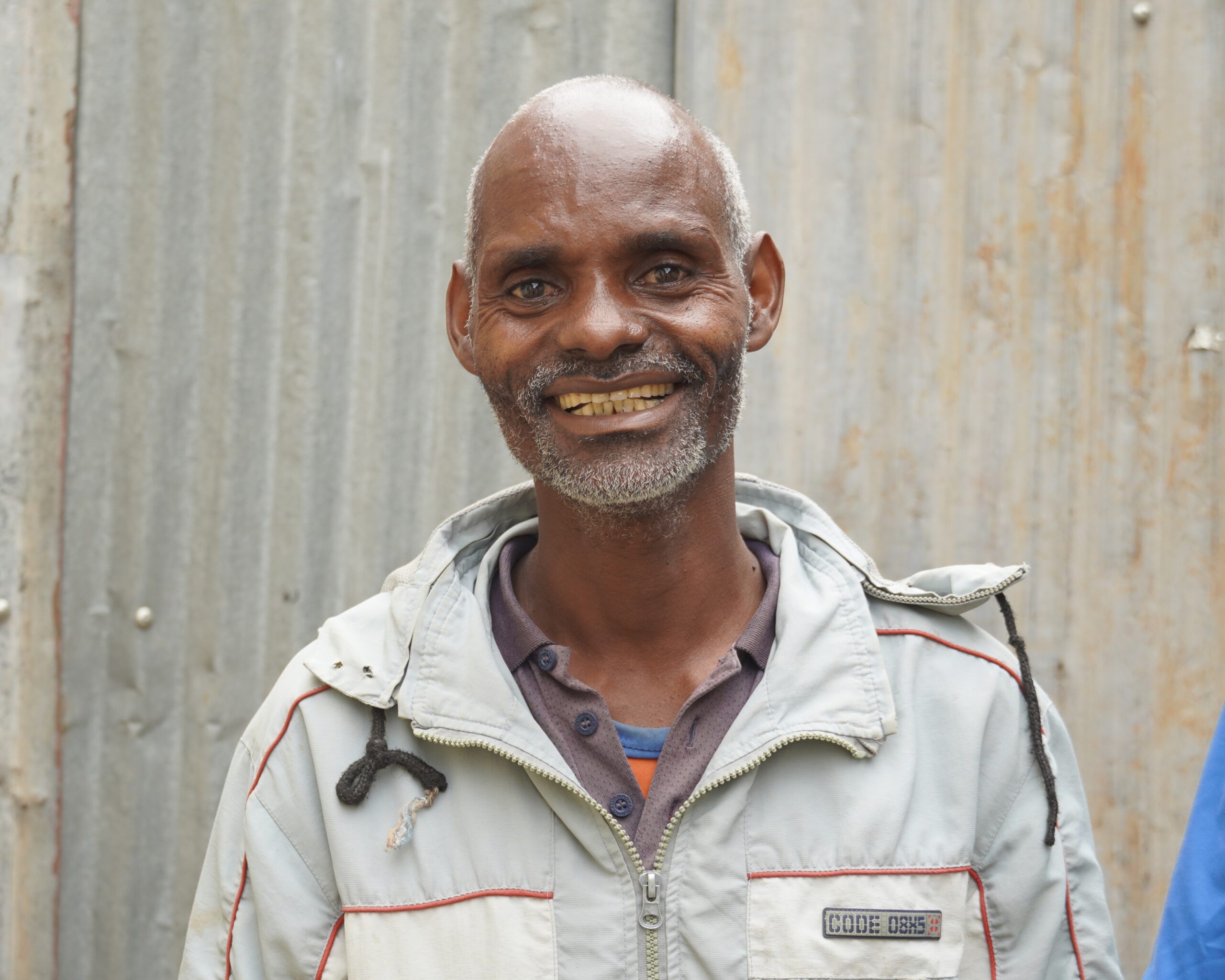Getu smiling outside in the courtyard at Yirgalem General Hospital's TB Treatment Initiation Center_2