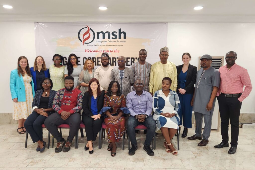 Participants and trainers pose for a photo during the TOPAFA Learning Lab