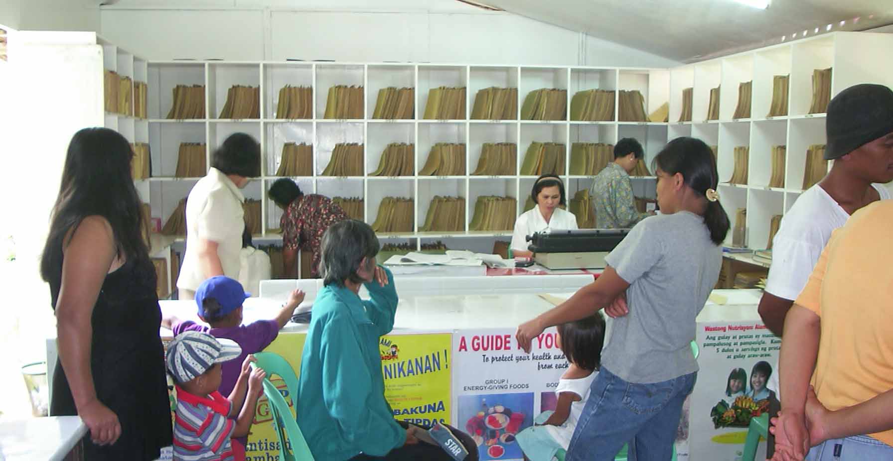 Several people in a pharmacy