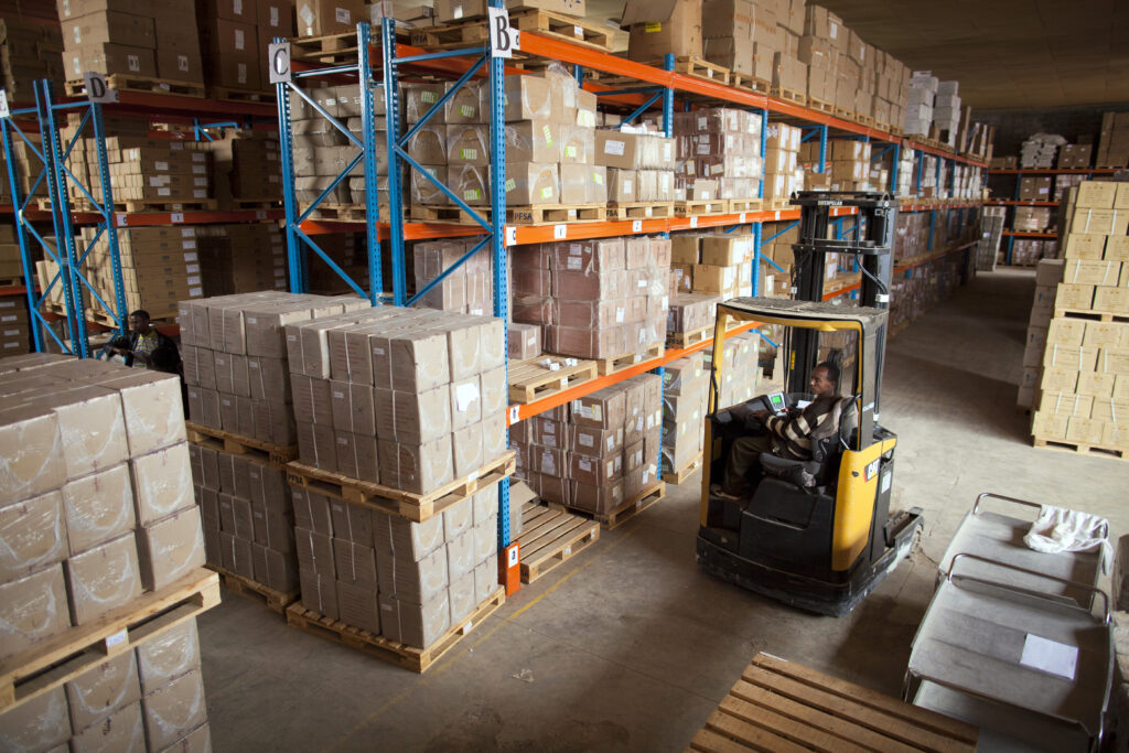 A forklift worker in a warehouse in Ethiopia. Photo Credit: Jiro Ose