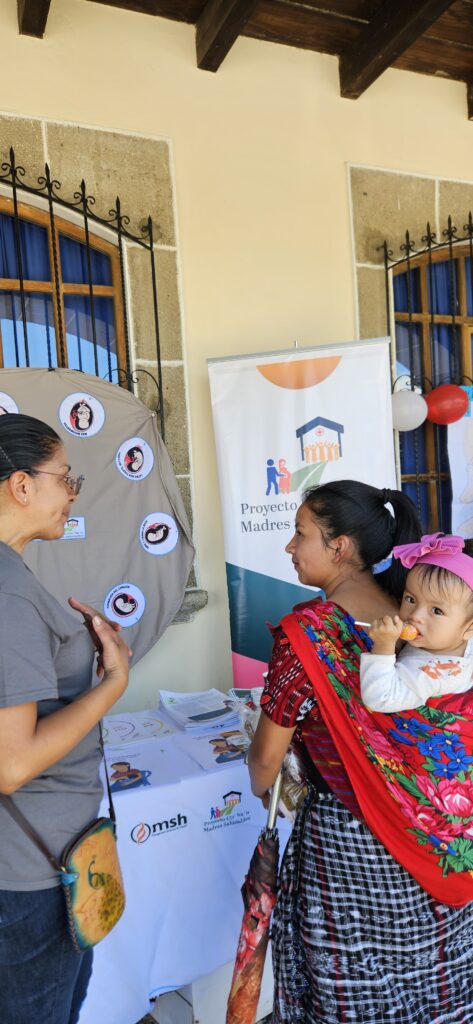 Mother and baby at Utz Nan event