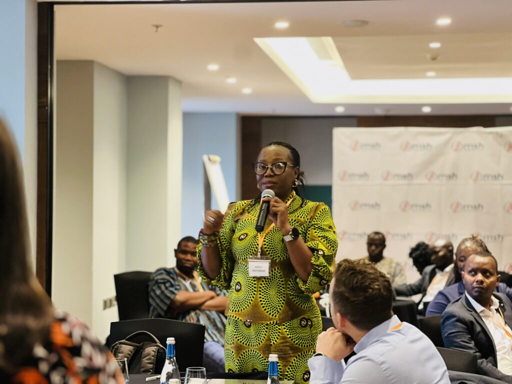 A woman talking at a leadership development meeting