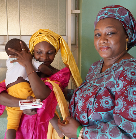 Mme. Toure with a client at a health facility